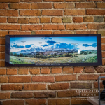 Signature Archival Fine Art Metal Aluminum Photography Prints of Snow Range Mountains Peaks | Art Gallery Wall Display in Historic Downtown Laramie, Wyoming on Brick Wall| | Fine Art Nature, Landscape, and Western Photography from Wyoming and the Rocky Mountains | Seneca Creek Studios by Allison Pluda | SenecaCreekStudios.com